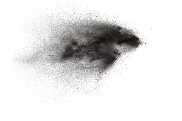 istock Black particles splatter on white background. Black dust splash on white background. 1062961236