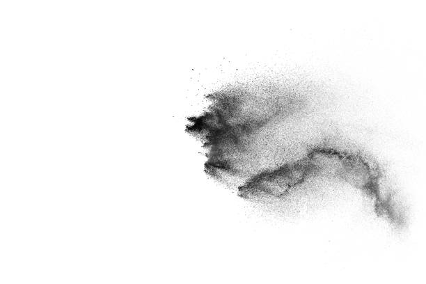 istock Black particles splatter on white background. Black dust splash on white background. 1062962260