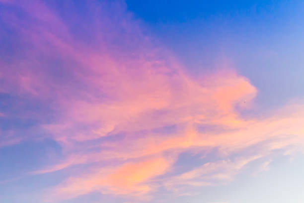 istock Dramatic red cloud against blue sky in the evening before sunset and sunrise. 1062965306