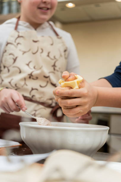 istock Brother and Sister Baking Christmas Cookies 1062965520