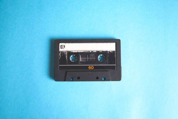 istock music vintage cassette on blue table background 1062965732