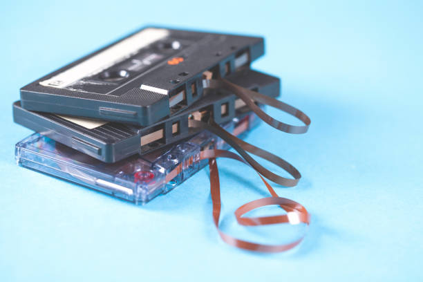 istock music vintage cassette on blue table background 1062965788