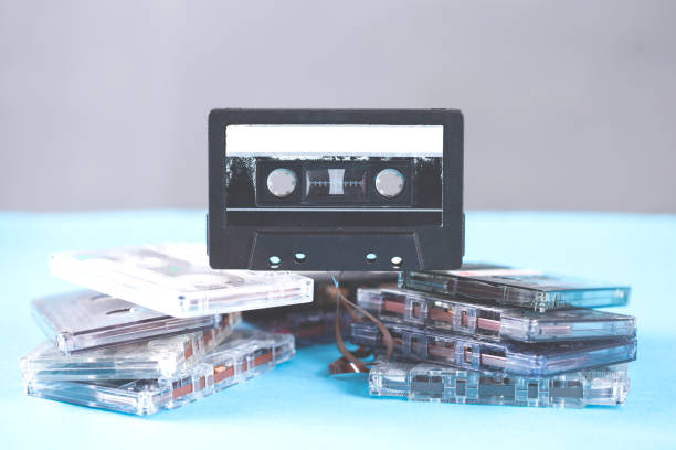 istock music vintage cassette on blue table background 1062965816