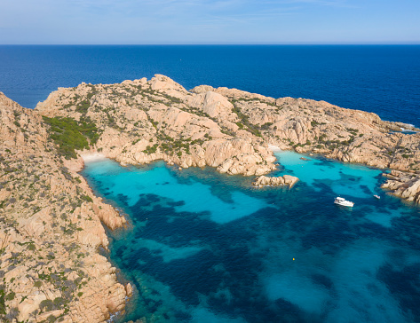 Aerial of the famous secluded Cala Coticcio Beach, Caprera Island, Sardinia, Italy. Converted from RAW.