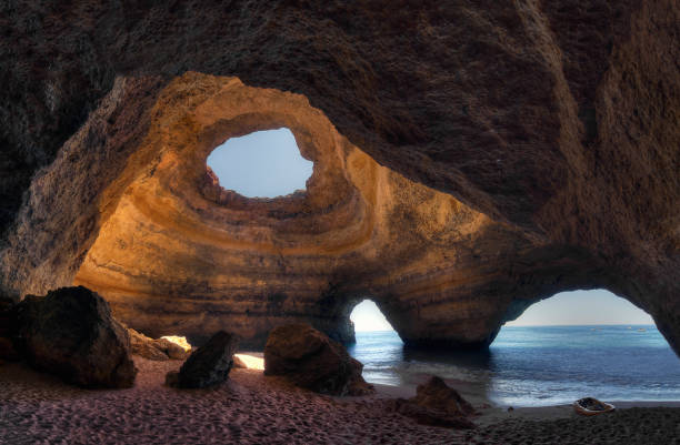 amazing sea cave located in Benagil, Algarve, Portugal View of the amazing sea cave located in Benagil, Algarve, Portugal. algar de benagil photos stock pictures, royalty-free photos & images