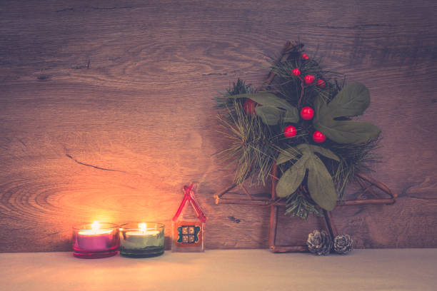 istock Christmas decoration on table with burning candles 1062974662