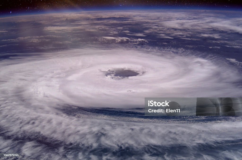 Huge hurricane eye. Elements of this image furnished by NASA. 2018. Hurricane - Storm Stock Photo