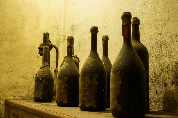 istock Old bottles of dusty wine 1062982826