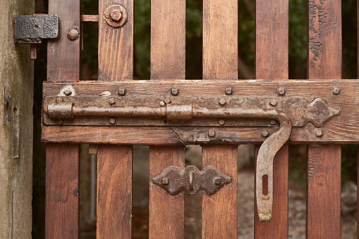 old beautiful latch on wooden gate