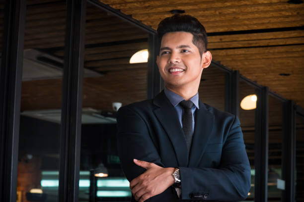 istock Smart looking young adult businessman 1063003132
