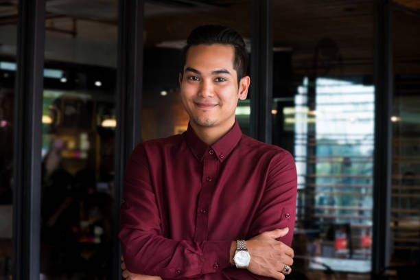 istock Smart looking young adult businessman 1063003192