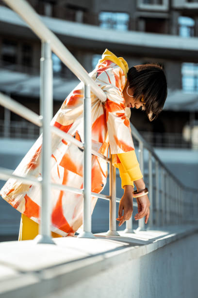 istock Dark-haired unusual model hanging on the railing 1063011362