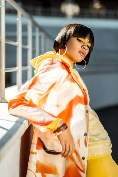 istock Egyptian styled model leaning on the parapet during photo shoot 1063011414