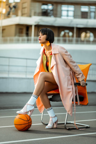 istock Determined extraordinary female rising up from armchair 1063022070