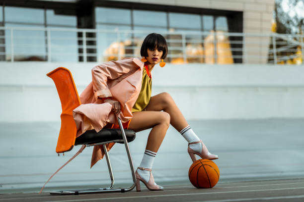 istock African American dark-haired female playing with ball 1063022180