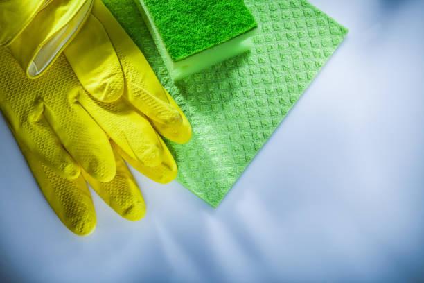 istock Household washcloth sponge protective gloves on white surface 1063022724