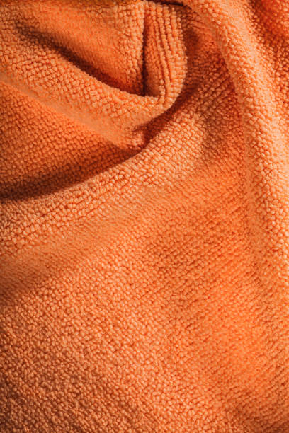 istock New household orange dishwashing rag 1063025116