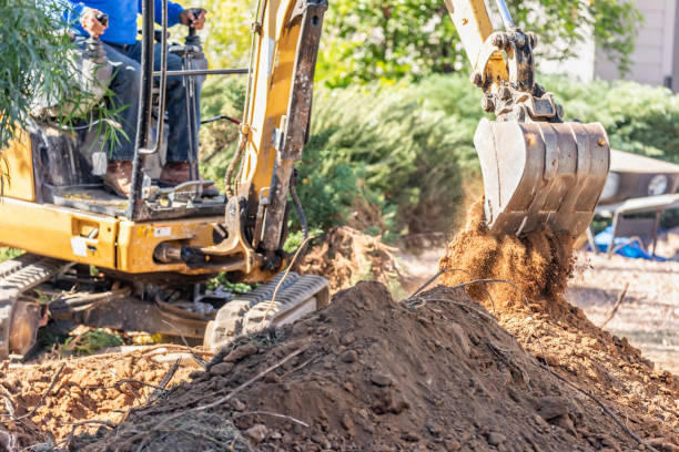 istock Working Excavator Tractor Digging A Trench At Construction Site 1063028158