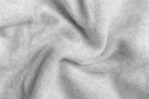 Warm Cashmere Wool Close-up Gray crumpled cashmere wool close-up cashmere stock pictures, royalty-free photos & images