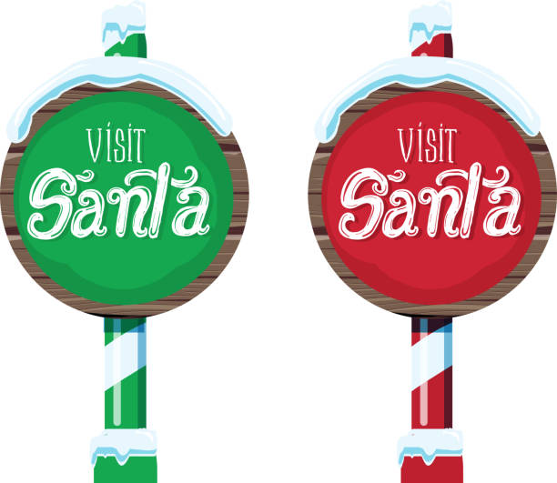 istock Wooden winter Christmas Visit Santa sign with handwriting or hand lettered text 1063039832