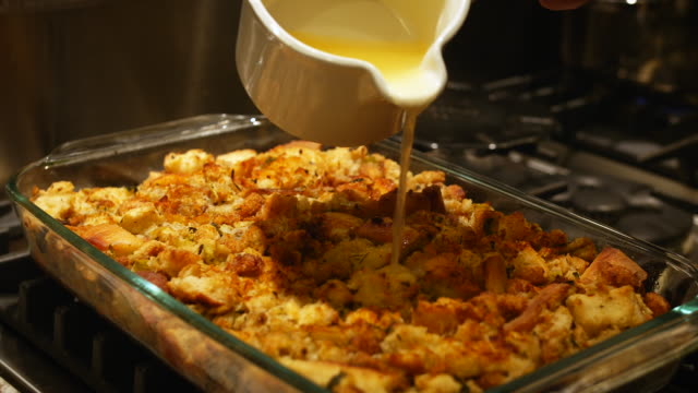 Authentic Shot of Butter Poured on Stuffing for Holiday Meal