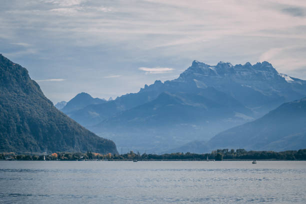istock Lake looking over a mountain in Switzerland 1063041734