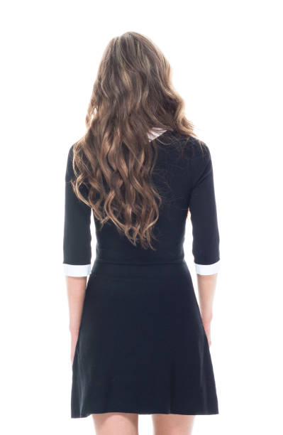 istock Beautiful young businesswoman with hands by her side 1063046490