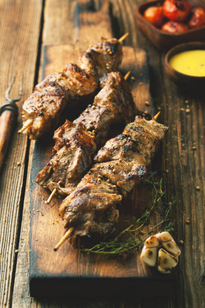 istock Raw meat on skewers. 1063053740