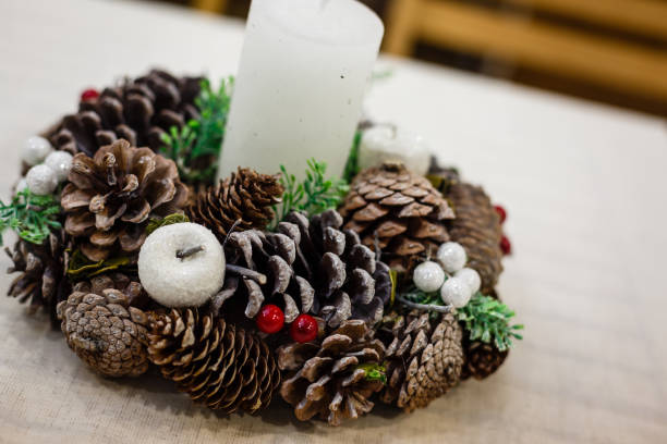istock Christmas eve, decorated advent wreath with a candle, isolated 1063060268