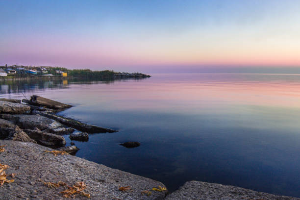 istock landscape on the water - sunset on the coast (horizon). top view. 1063062326