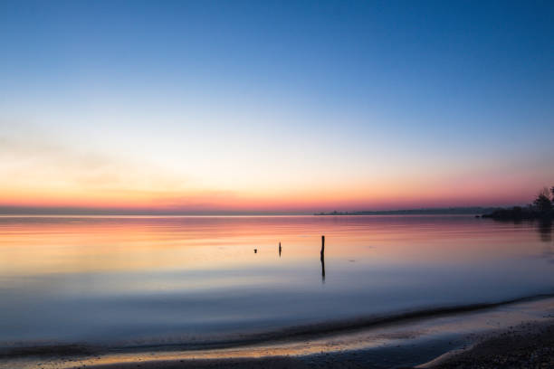istock landscape on the water - sunset on the coast (horizon). top view. 1063062538