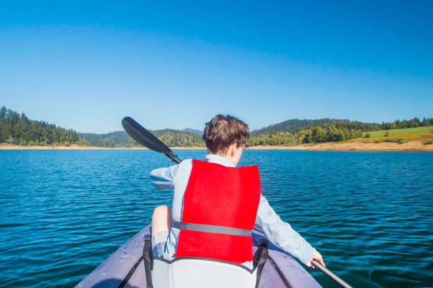 istock Young woman kayaking 1063062716