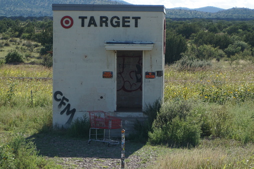 Across west Texas museums are popping up like this out in the middle of nowhere.  This building is complete with a Target store brand logo and inside the graffiti is everywhere.  People leave food and water inside and it appears to be a place very near the Texas border where people who are crossing can get supplies that are much needed in a dry and arid climate.  On our way back through this area someone had added a Target shopping cart.  It provides a bit of humor as it is a very long road to travel.  There are no doors or windows, just an open building.  It is on U.S. 90 in Texas near the city of Marathon.