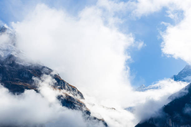 The Swiss Alps against moody clouds above
