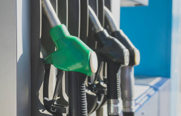 istock Three refueling nozzles on gas station. 1063070792