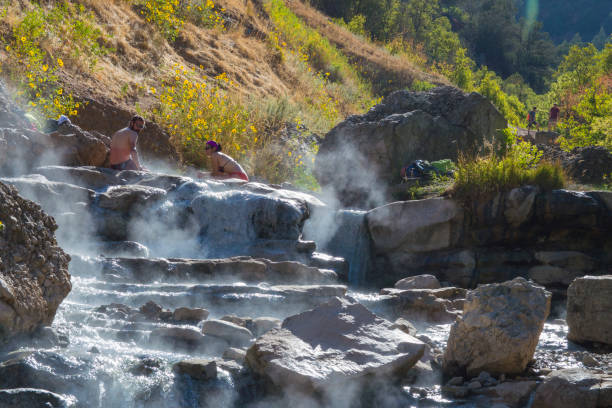 Simmering in Diamond Fork Hot Springs stock photo