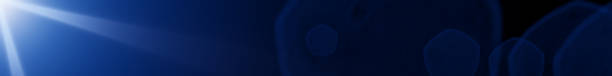 istock blue lens flare effect overlay texture in front of a black background - leaderboard format 1063073346