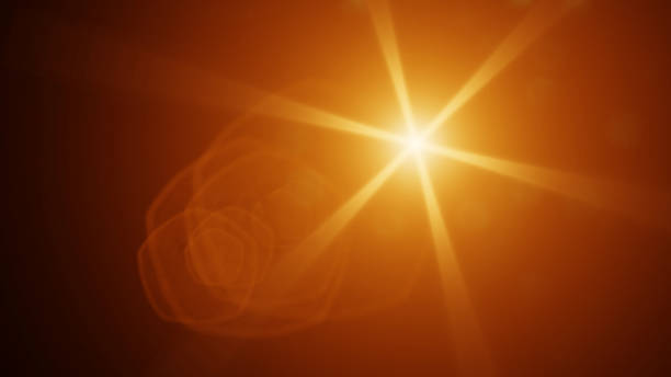 istock intense gold lens flare effect overlay texture with bokeh effect and light streaks in front of a black background 1063074772