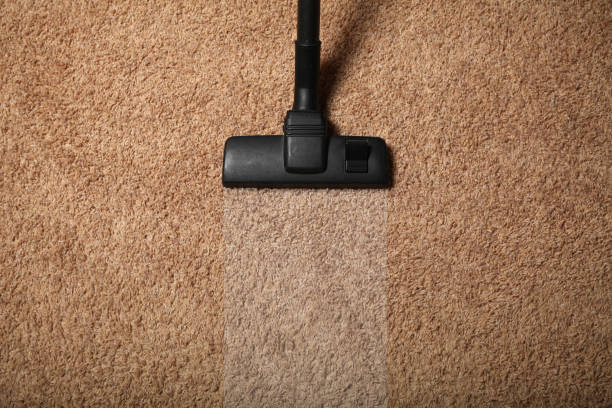 istock Room cleaning service, vacuum cleaner on dirty carpet 1063081914