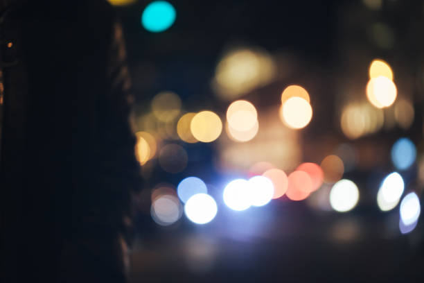 istock Defocused Background with Car Traffic Lights 1063083094