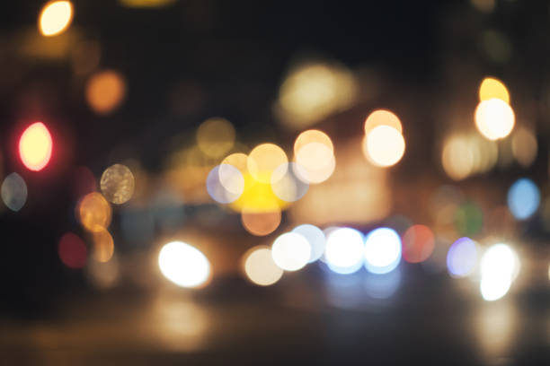 istock Defocused Background with Car Traffic Lights 1063083204