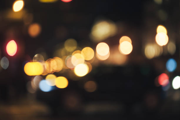 istock Defocused Background with Car Traffic Lights 1063083240