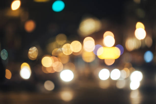 istock Defocused Background with Car Traffic Lights 1063083258