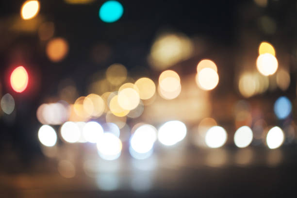 istock Defocused Background with Car Traffic Lights 1063083338