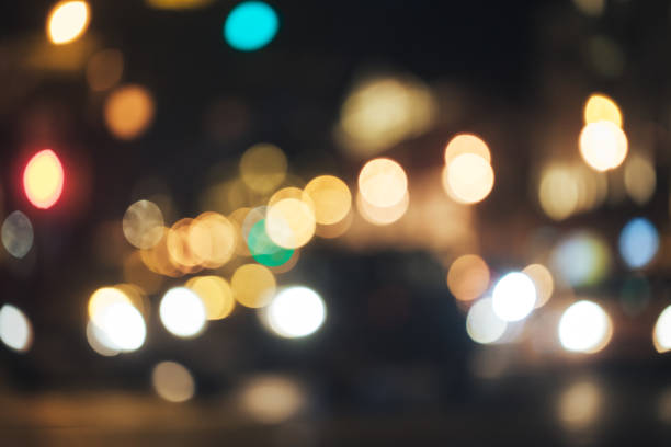 istock Defocused Background with Car Traffic Lights 1063083518