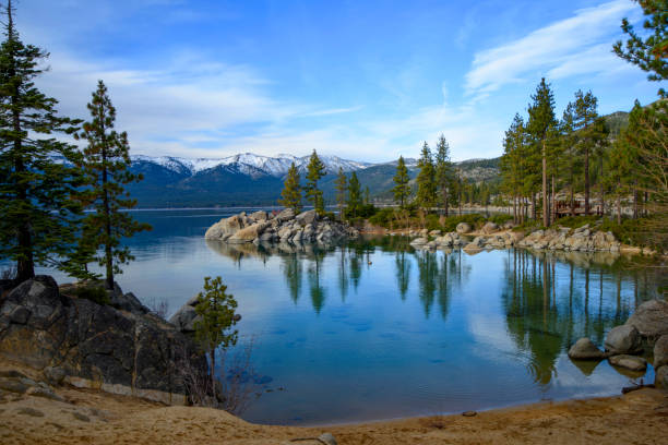 lake tahoe with snow capped mountain - nevada landscape rock tree imagens e fotografias de stock