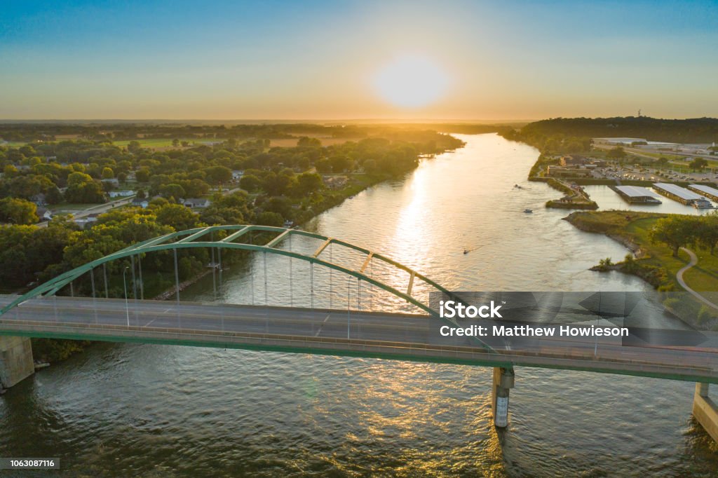 Sunset on Big Muddy Sunset over Veteran's Memorial Bridge in Sioux City over the Missouri River. Iowa Stock Photo