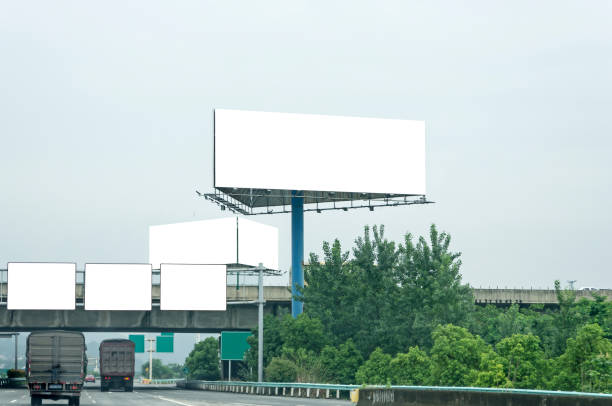 istock Blank billboard on blue sky background for new advertisement 1063091474
