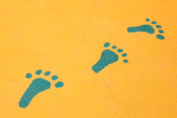 istock footprints are on the yellow ground 1063091820