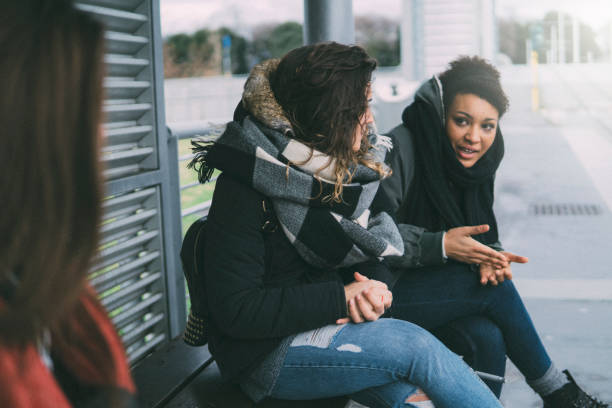 istock Female friends waiting for the tram 1063097940